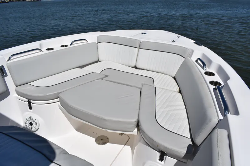 Slide: The Image of 2021 Sea Fox 268 Commander boat with spacious seating area on calm water. - 11