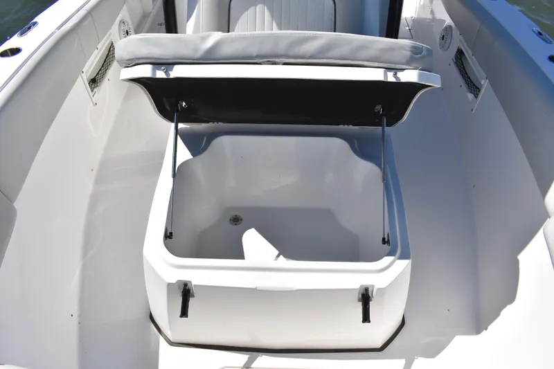 Slide: The Image of Open storage compartment on a 2021 Sea Fox 268 Commander boat. - 26