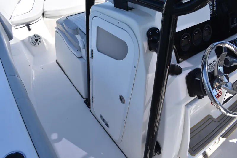 Slide: The Image of Interior view of 2021 Sea Fox 268 Commander boat, featuring helm and seating area. - 28
