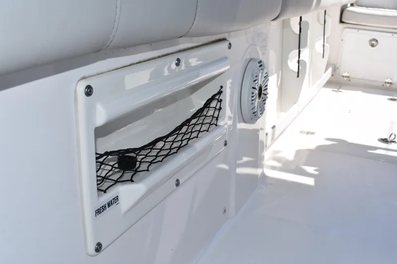Slide: The Image of 2021 Sea Fox 268 Commander boat interior with fresh water compartment and speaker. - 31