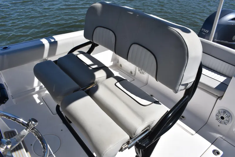 Slide: The Image of 2021 Sea Fox 268 Commander boat seating with cushioned backrest and armrests. - 33