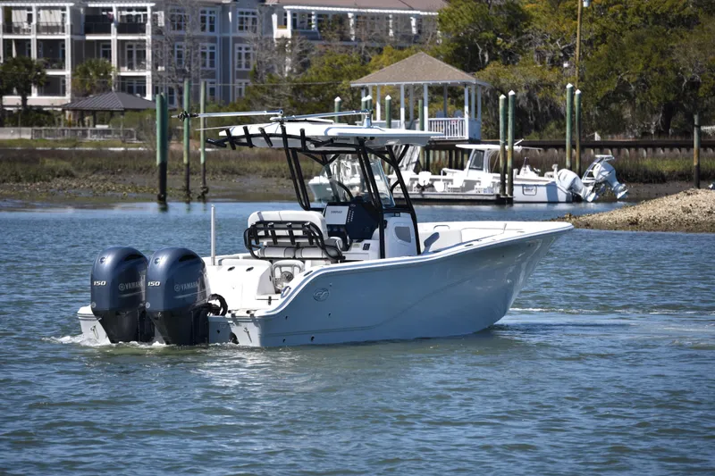 Slide: The Image of 2021 Sea Fox 268 Commander boat with dual Yamaha engines on calm water. - 4