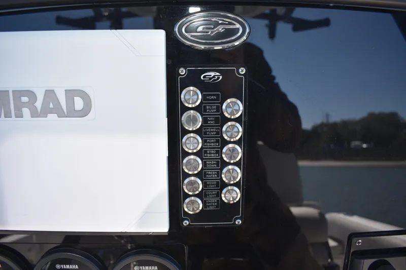 Slide: The Image of Control panel of a 2021 Sea Fox 268 Commander boat with Simrad display. - 42