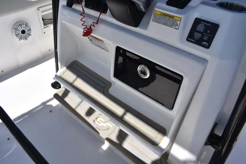 Slide: The Image of Interior view of 2021 Sea Fox 268 Commander boat console and storage compartment. - 43