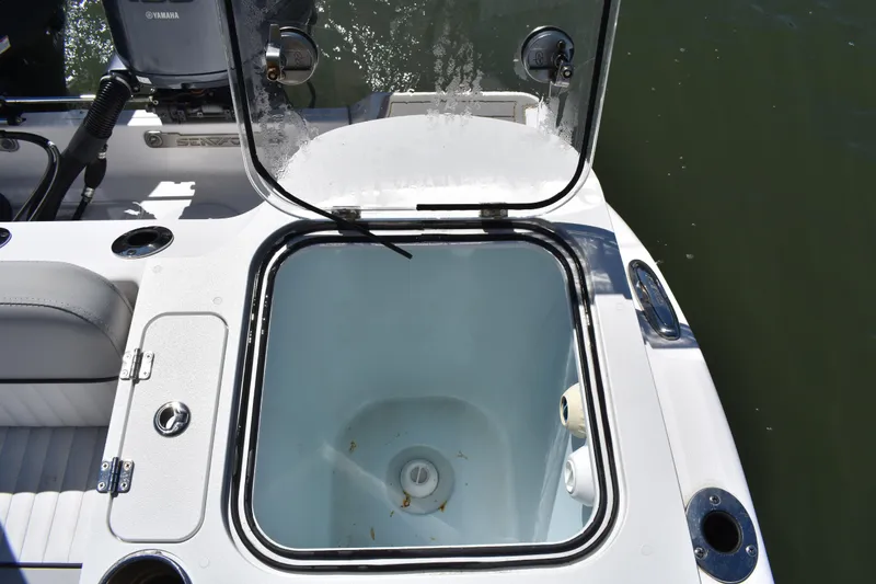 Slide: The Image of Open livewell on a 2021 Sea Fox 268 Commander boat, showcasing interior details. - 50