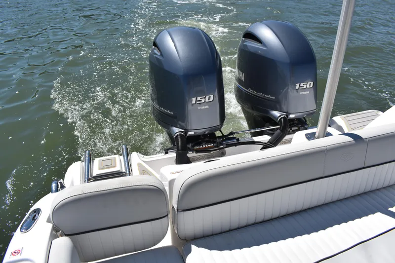 Slide: The Image of 2021 Sea Fox 268 Commander boat with twin Yamaha 150 engines on water. - 54