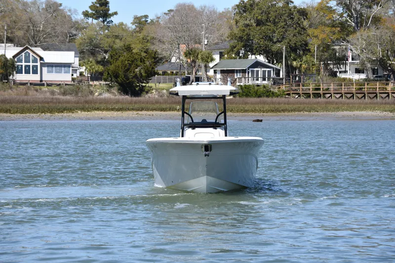 Slide: The Image of 2021 Sea Fox 268 Commander boat cruising on a calm river near residential area. - 9