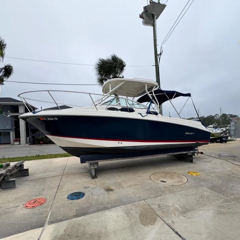 Slide: The Image of 2014 Wellcraft 252 Coastal boat on a trailer. - 4