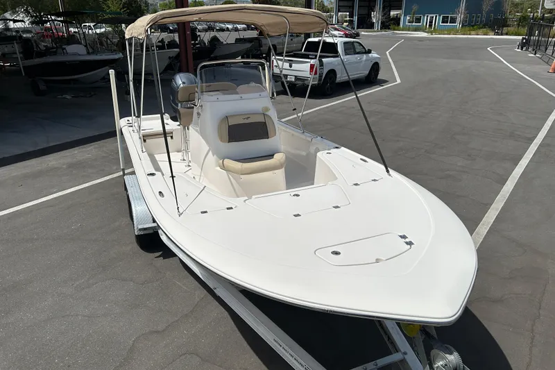 Slide: The Image of 2020 Tidewater 2110 Bay Max boat on trailer in parking lot. - 6