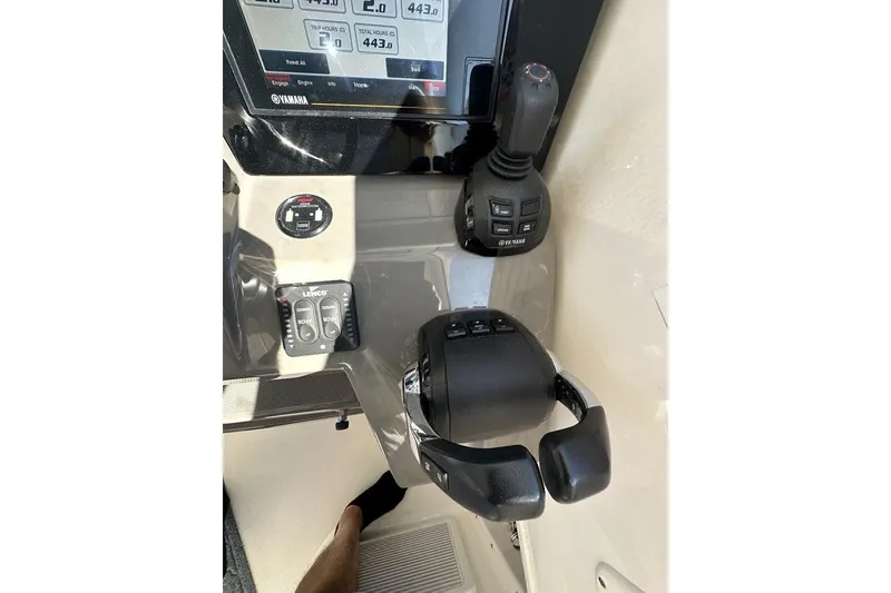 Slide: The Image of Control panel of 2020 Pursuit OS 355 Offshore boat with Yamaha joystick and display. - 11