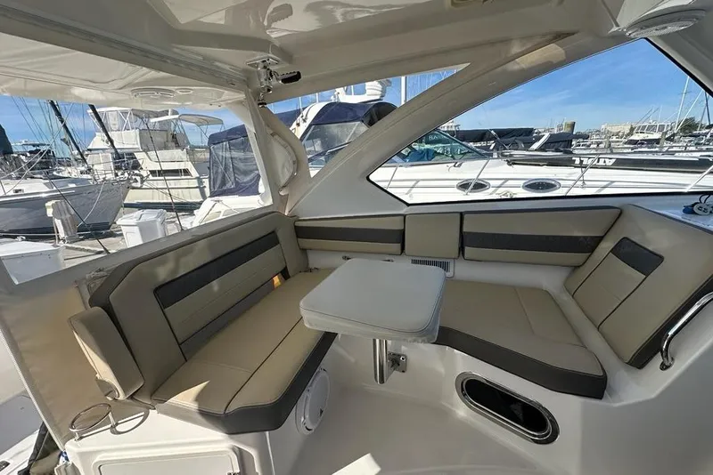 Slide: The Image of Luxurious interior of 2020 Pursuit OS 355 Offshore boat with comfortable seating. - 4