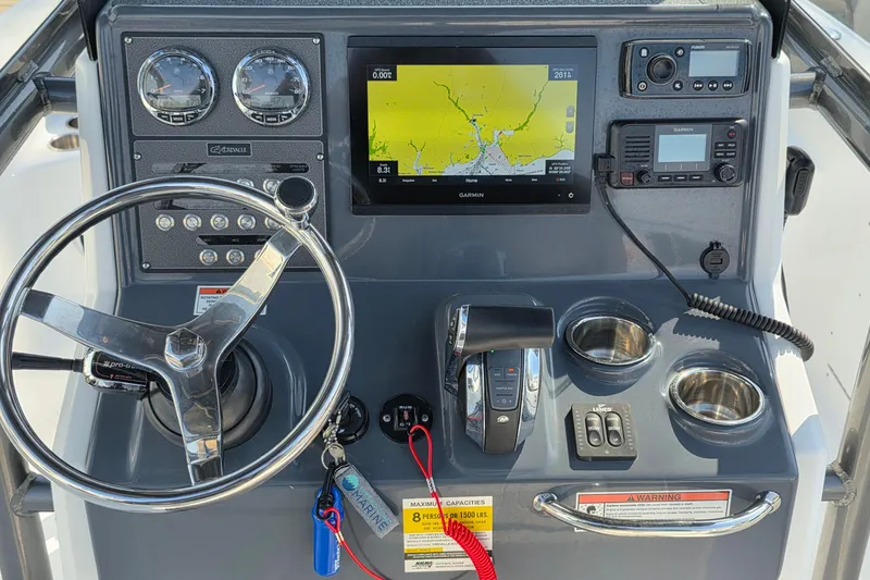 Slide: The Image of Dashboard of a 2021 Crevalle 24 HCO boat with Garmin navigation system. - 25