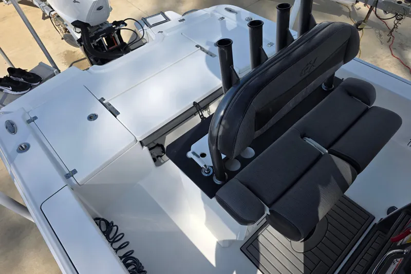 Slide: The Image of 2021 Crevalle 24 HCO boat interior with seating and rod holders. - 26
