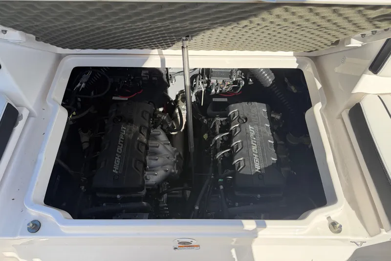 Slide: The Image of 2022 Yamaha Boats 252 FSH Sport engine compartment with high output engines. - 27