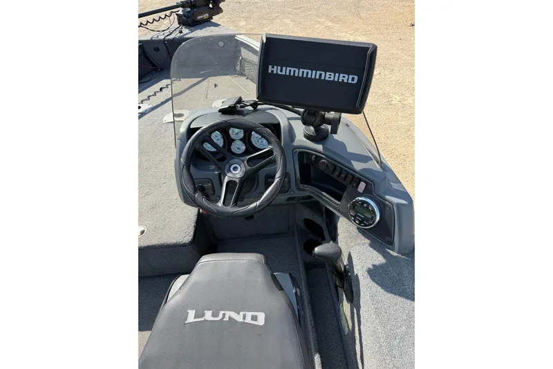 Slide: The Image of 2017 Lund 1775 Impact SS boat dashboard with Humminbird fish finder. - 11