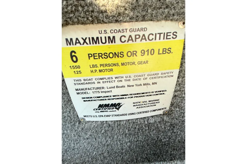Slide: The Image of 2017 Lund 1775 Impact SS capacity label, 6 persons or 910 lbs, U.S. Coast Guard compliant. - 13
