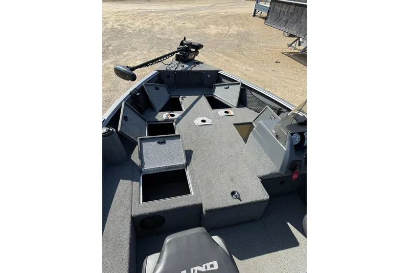 Slide: The Image of 2017 Lund 1775 Impact SS boat interior with open storage compartments. - 4