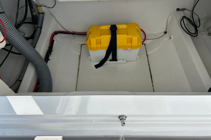 Slide: The Image of 2023 Jeanneau Leader 6.5 CC Series 3 boat interior with battery compartment. - 16