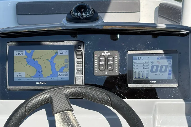 Slide: The Image of Dashboard of 2023 Jeanneau Leader 6.5 CC Series 3 with Garmin and Yamaha displays. - 3