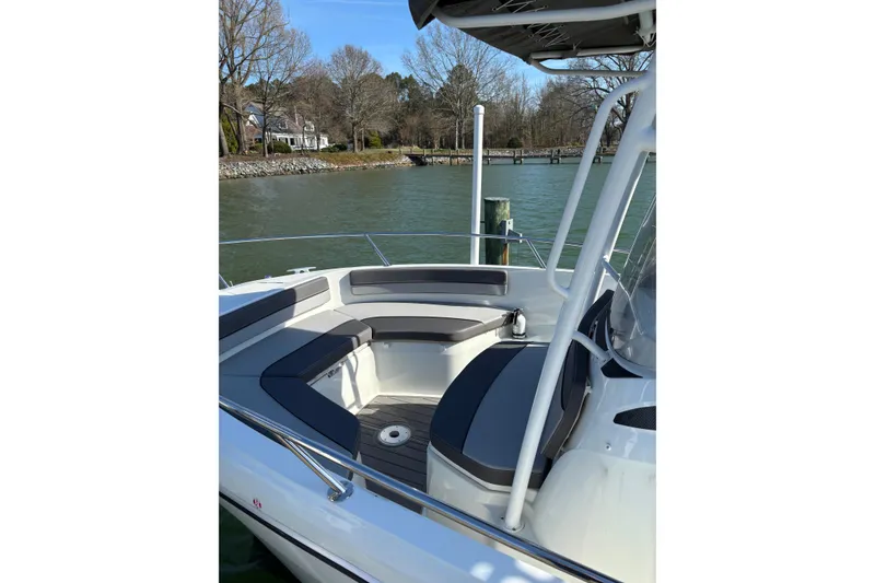 Slide: The Image of 2023 Jeanneau Leader 6.5 CC Series 3 boat with spacious seating area. - 7