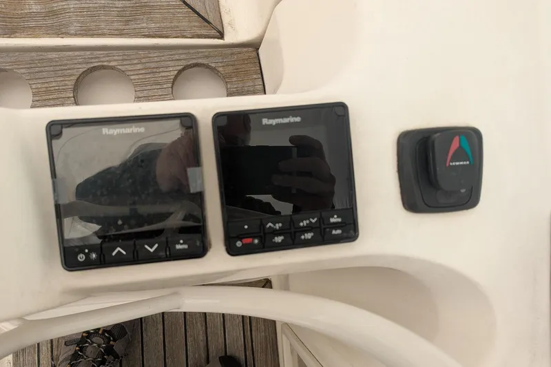 Slide: The Image of Raymarine navigation equipment on 2007 Elan Impression 434 yacht dashboard. - 12