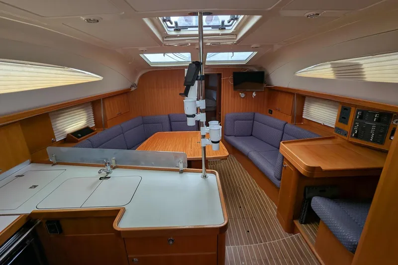 Slide: The Image of Interior of 2007 Elan Impression 434 yacht with cozy seating and modern amenities. - 15