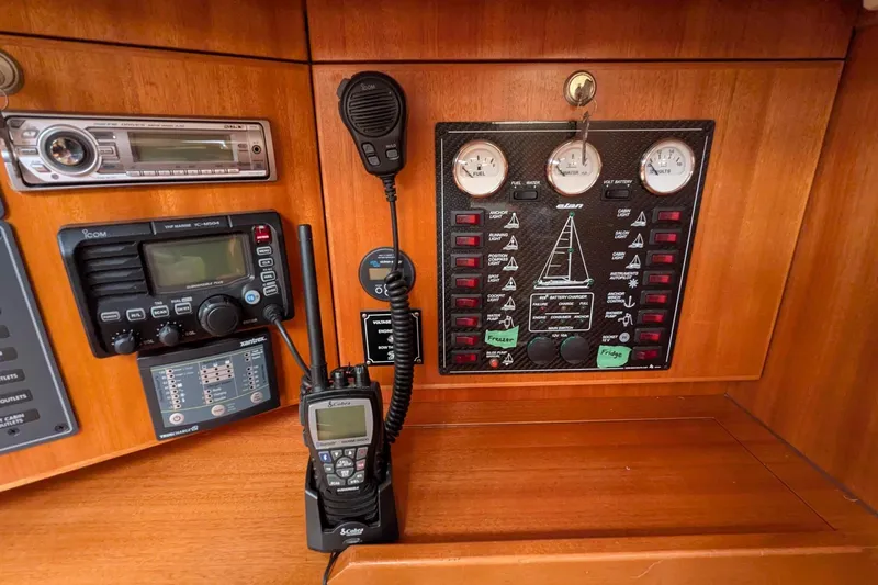 Slide: The Image of Control panel of a 2007 Elan Impression 434 yacht with communication devices. - 25