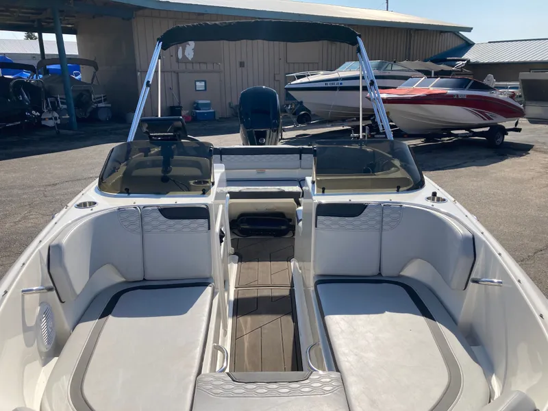 Slide: The Image of Interior view of a 2022 Bayliner Element M17 boat at the dock. - 8