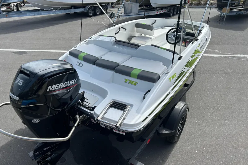 Slide: The Image of 2021 Tahoe T16 boat with Mercury 75 engine on trailer. - 7