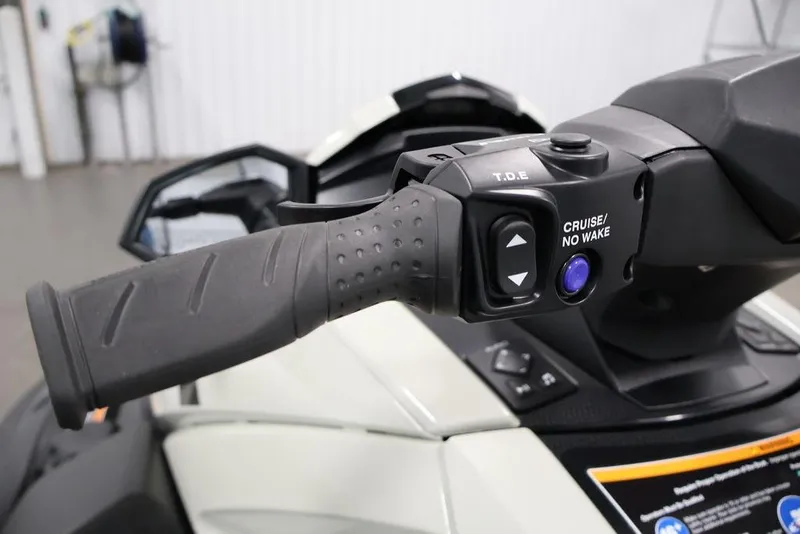 Slide: The Image of Handlebar controls of a 2026 Yamaha WaveRunner VX Cruiser HO, featuring cruise and no wake buttons. - 13
