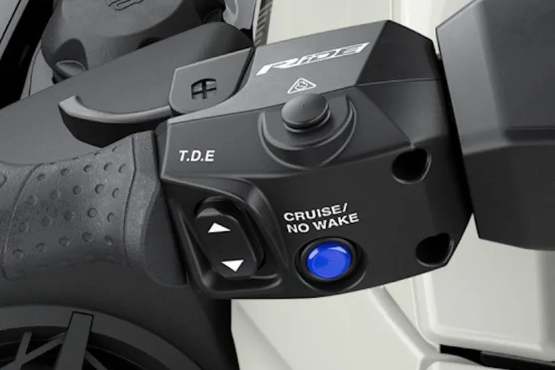 Slide: The Image of Close-up of 2026 Yamaha WaveRunner VX Cruiser HO control panel with cruise and no wake buttons. - 27