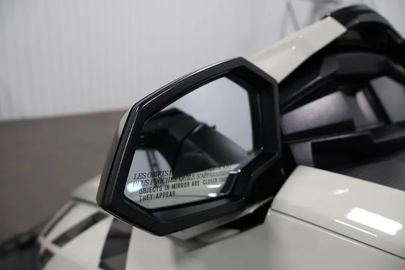 Slide: The Image of Side mirror of 2026 Yamaha WaveRunner VX Cruiser HO, showing warning text. - 7