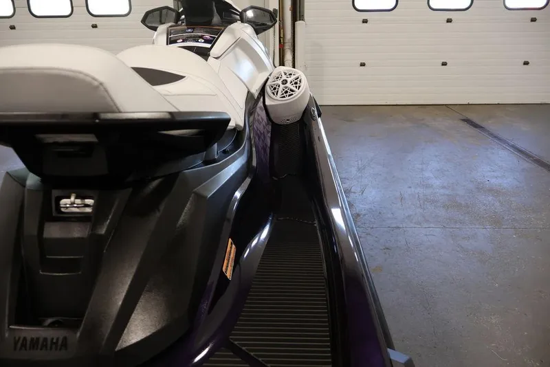 Slide: The Image of 2026 Yamaha WaveRunner VX Cruiser HO in a garage, showcasing sleek design and seating. - 20