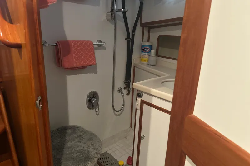 Slide: The Image of Bathroom interior of 2000 Island Gypsy 36 yacht with shower and sink. - 15