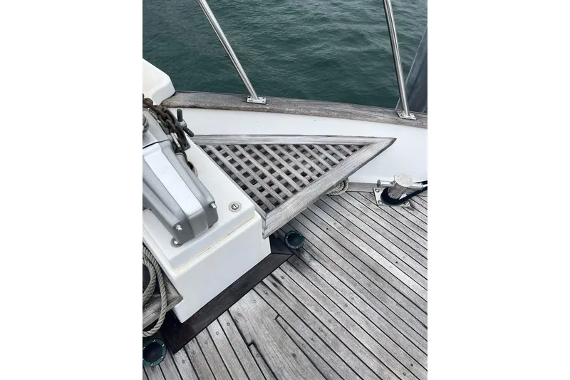 Slide: The Image of 1986 Sea Ranger 47 Pilothouse deck with wooden flooring and metal fittings. - 25