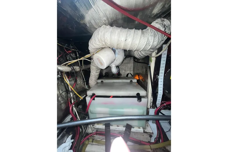 Slide: The Image of Engine room of 1986 Sea Ranger 47 Pilothouse with wiring and ventilation ducts. - 59