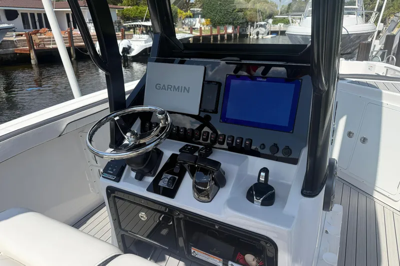 Slide: The Image of 2024 Yamaha Boats 255 FSH Sport H dashboard with Garmin navigation system. - 3