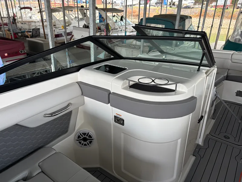 Slide: The Image of Interior of a 2020 Sea Ray SDX 270 with gray upholstery. - 12