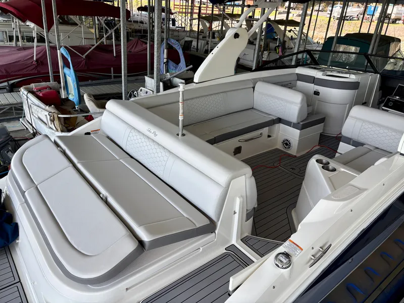 Slide: The Image of Interior of a 2020 Sea Ray SDX 270 boat in a marina. - 3