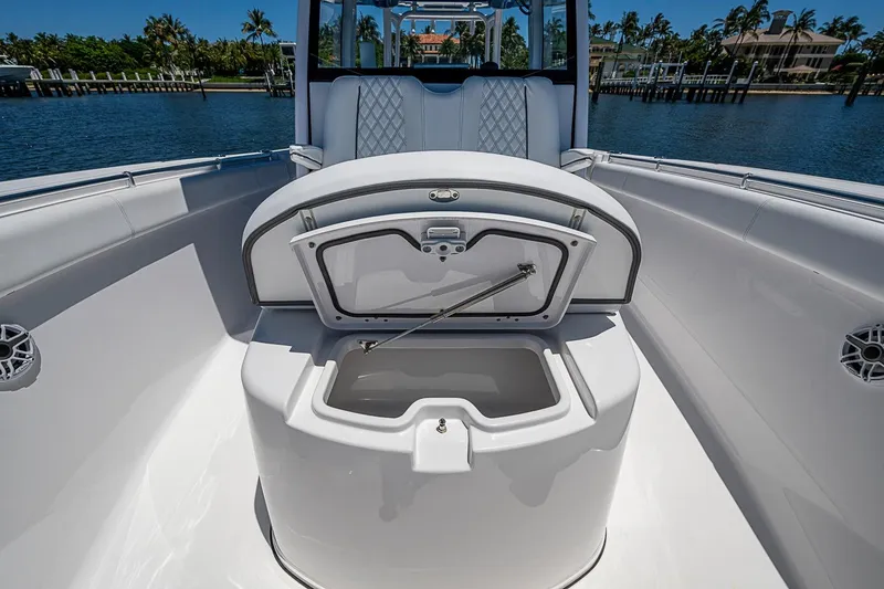 Slide: The Image of 2023 Sportsman Open 352 Center Console boat interior with open storage compartment. - 9