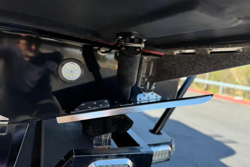 Slide: The Image of Close-up of 2017 Tigé RZ2 boat's underwater gear and LED light. - 11