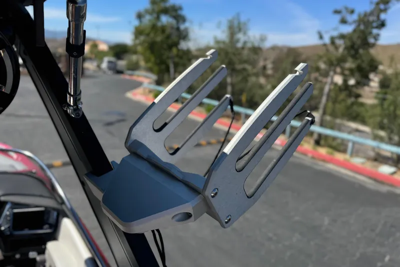 Slide: The Image of Wakeboard rack on 2017 Tigé RZ2 boat, parked outdoors. - 21