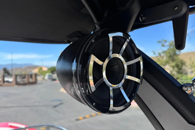 Slide: The Image of Close-up of a 2017 Tigé RZ2 boat speaker with a sleek metallic grille. - 22