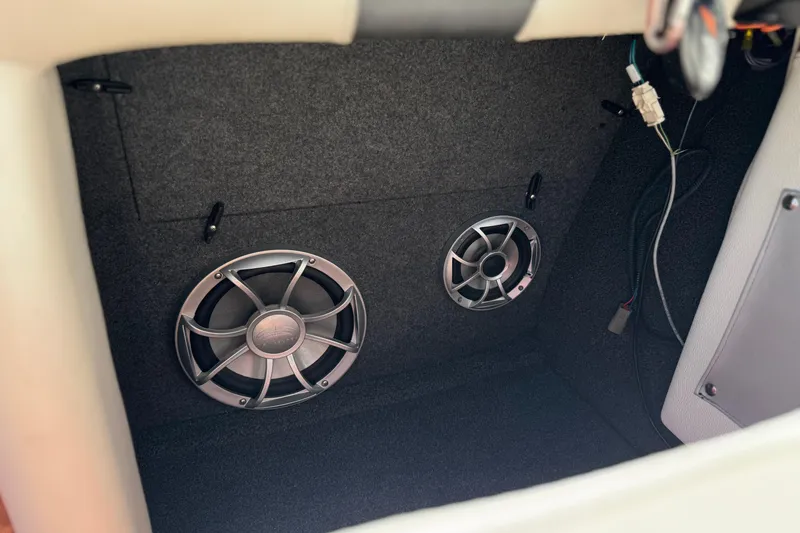 Slide: The Image of 2017 Tigé RZ2 boat interior with installed audio speakers and wiring. - 38