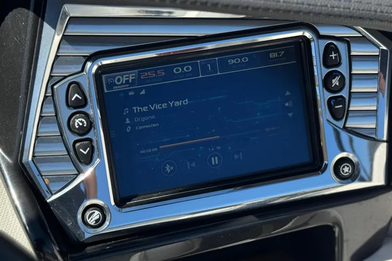 Slide: The Image of Touchscreen display in a 2017 Tigé RZ2 boat showing music controls and settings. - 39