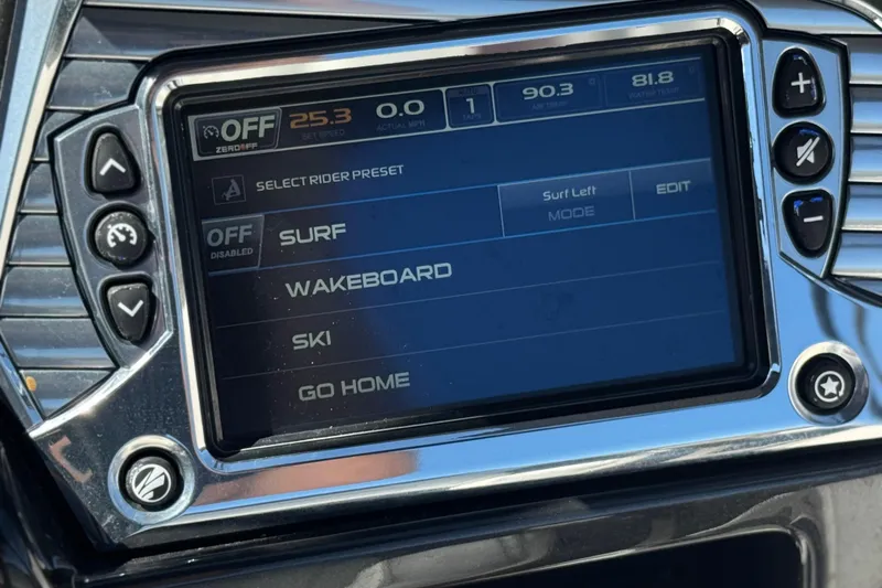 Slide: The Image of 2017 Tigé RZ2 boat dashboard display with surf, wakeboard, and ski mode options. - 41