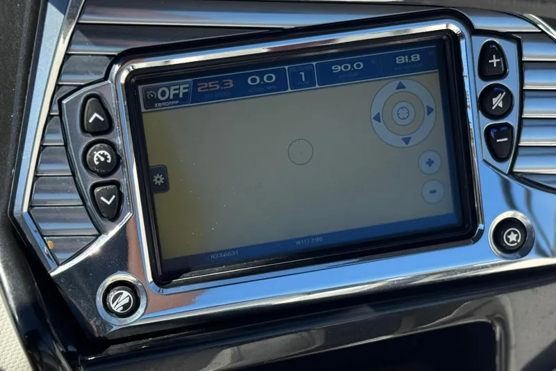 Slide: The Image of Dashboard display of a 2017 Tigé RZ2 boat with control buttons. - 42