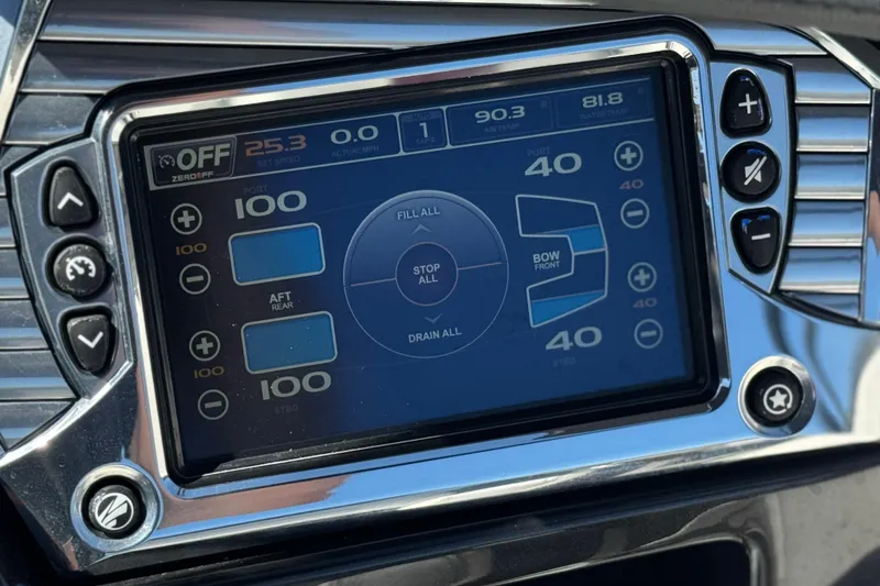 Slide: The Image of Touchscreen control panel of a 2017 Tigé RZ2 boat, displaying ballast settings. - 44