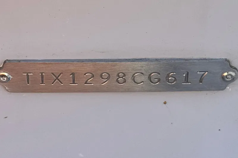 Slide: The Image of 2017 Tigé RZ2 boat identification plate with serial number TIX1298CG617. - 48