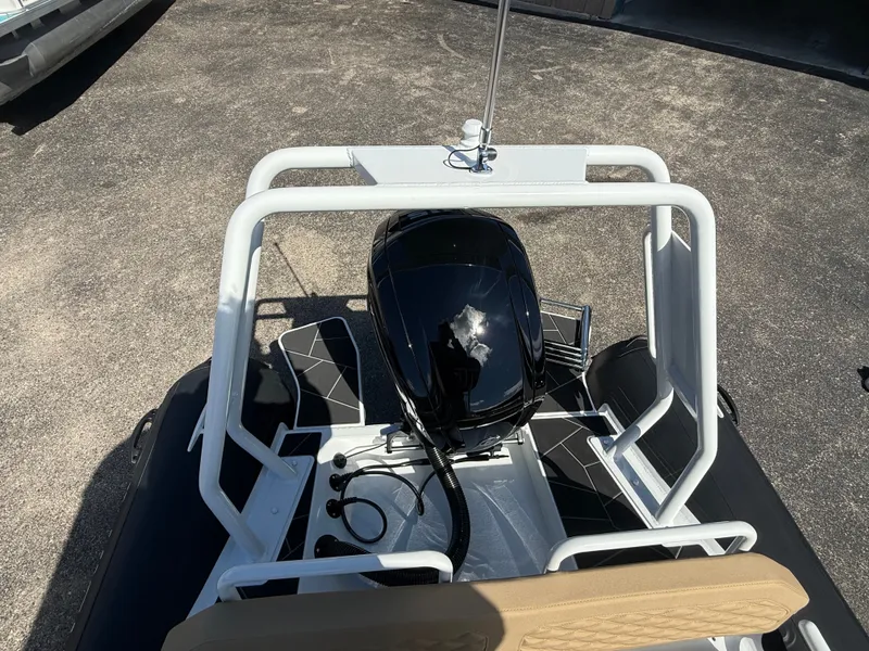 Slide: The Image of Highfield Sport 560 boat 2026 with top view of engine. - 5